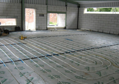 Office area underfloor heating installation in progress